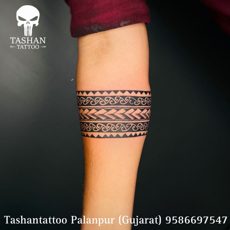 Unique geometric armband tattoo