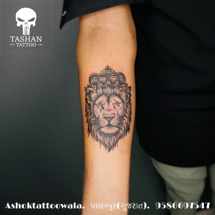 Lion tattoo with crown 