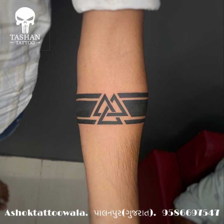 Triangle hand band tattoo